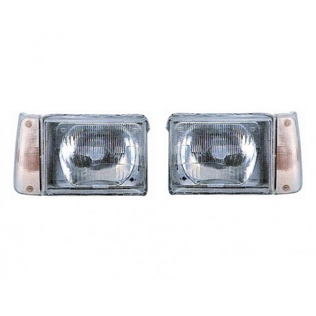 Coppia fari proiettori H4 - R2 regolazione manuale freccia bianca dx + sx